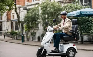 A Gentleman on a Compact Mobility Scooter